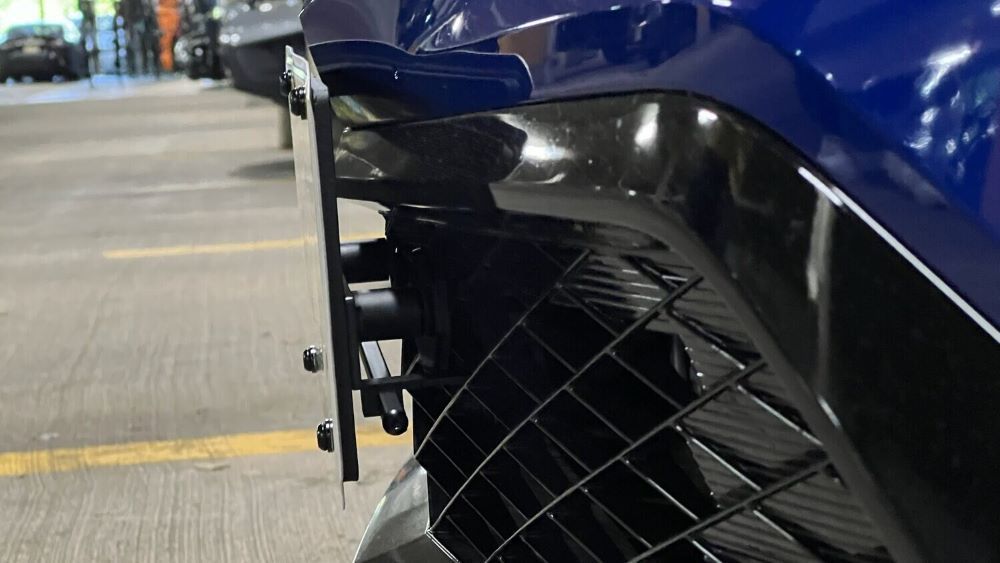Sly Bracket for Acura Integra with a mesh-style lower grille.