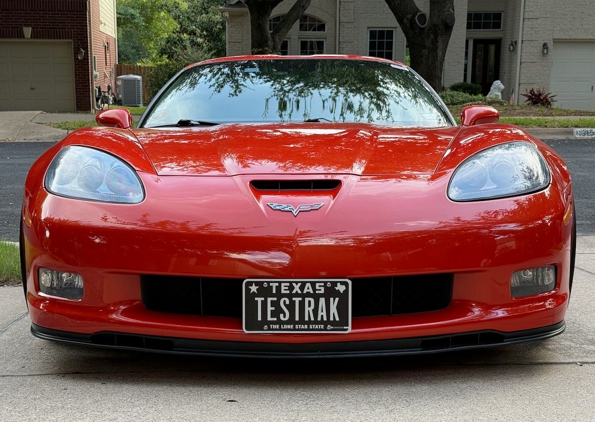Sly Bracket for Chevrolet Corvette with mesh-style lower grille.