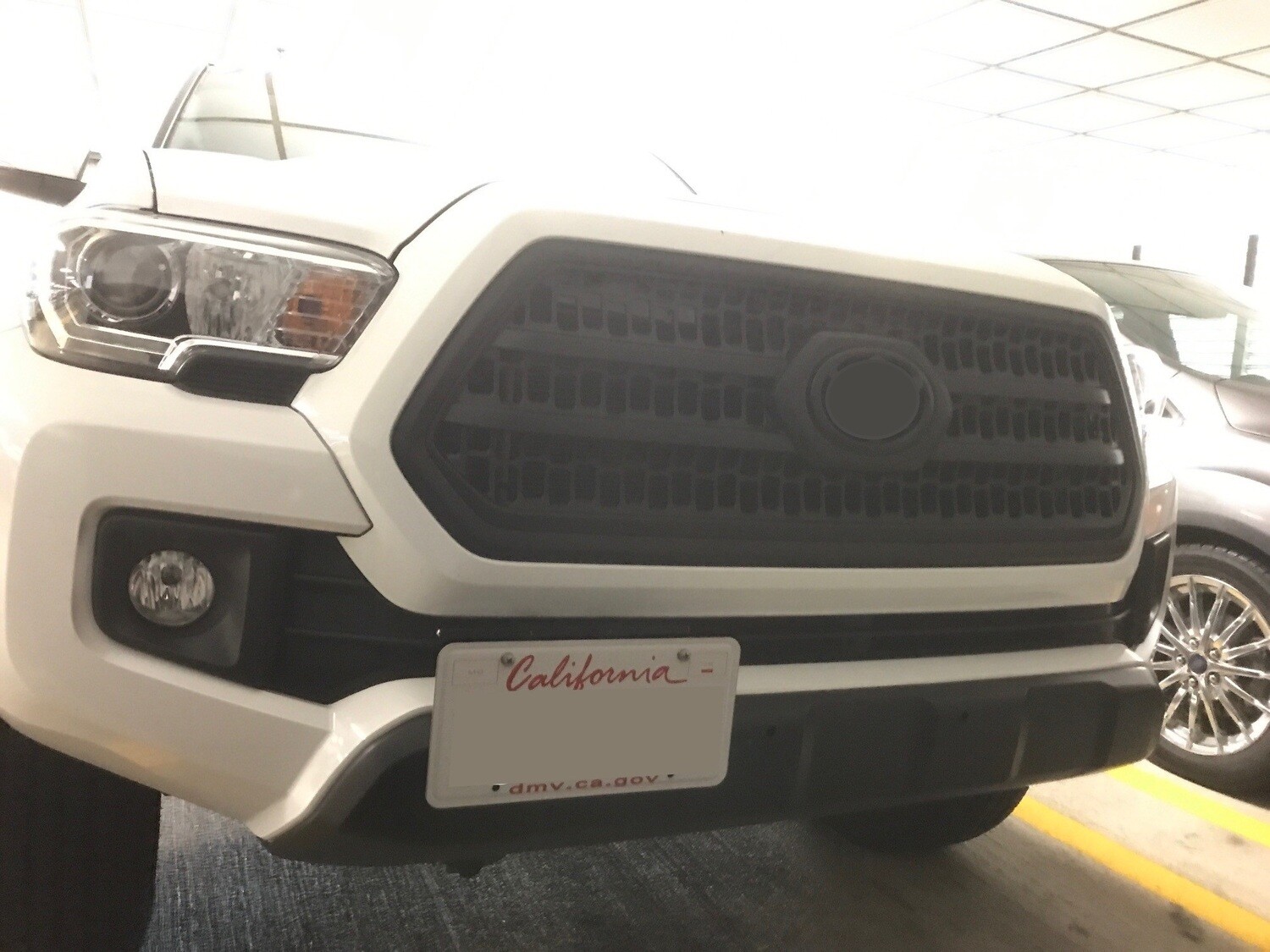 True no drill front license plate bracket for 2016-2023 TOYOTA TACOMA no holes grille mount frame relocator