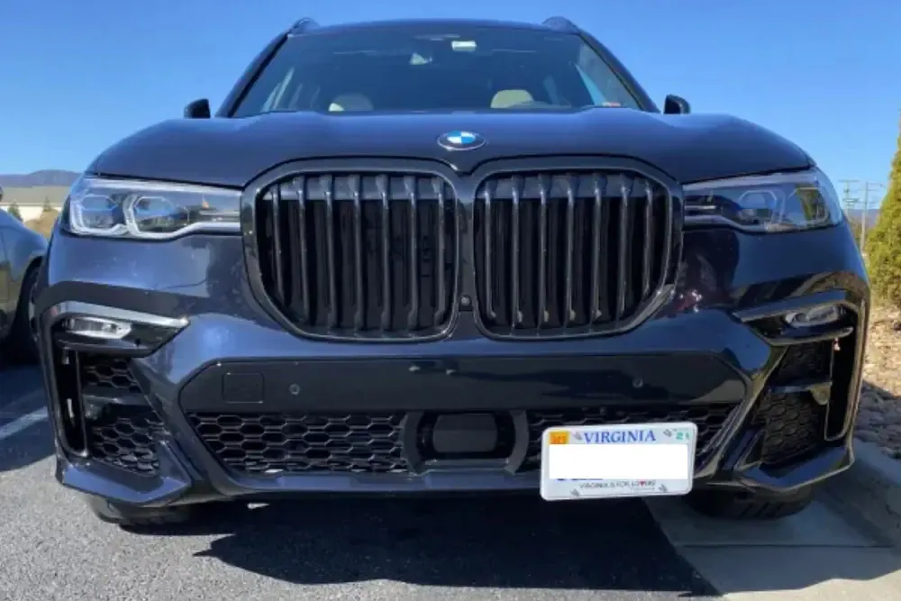 True no drill license plate bracket for BMW X7.  No drill No holes license plate holder mount bracket relocator.