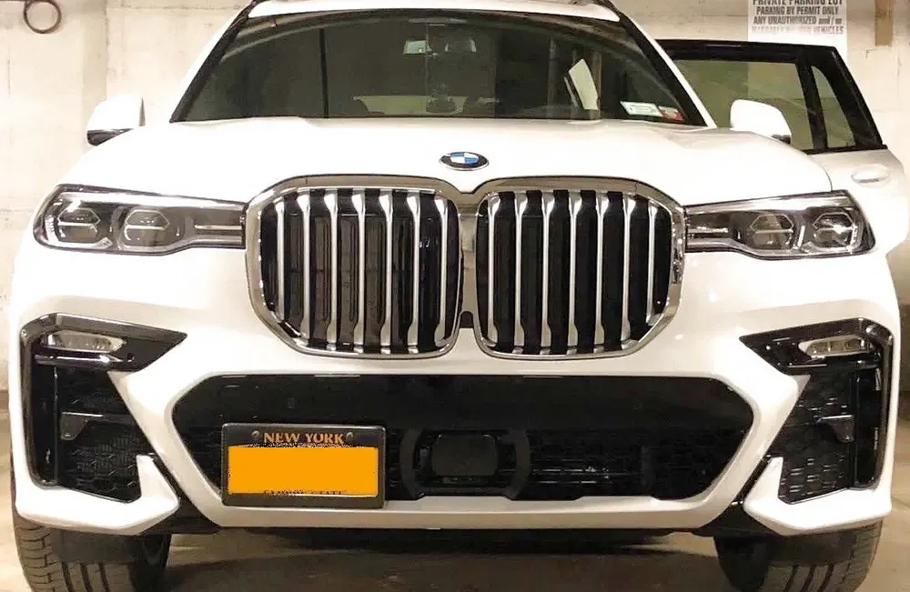 True no drill license plate bracket for BMW X7.  No drill No holes license plate holder mount bracket relocator.