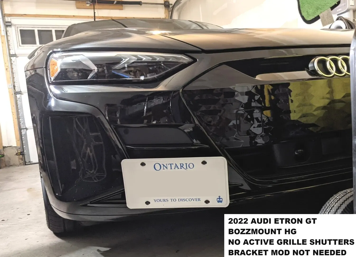 No-drill-holes license plate mount holder bracket relocator for Audi e-tron GT with side horizontal slats grille.