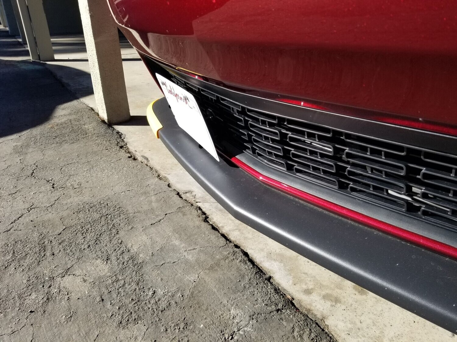 Sly Bracket for Dodge Challenger with mesh-style lower grille.