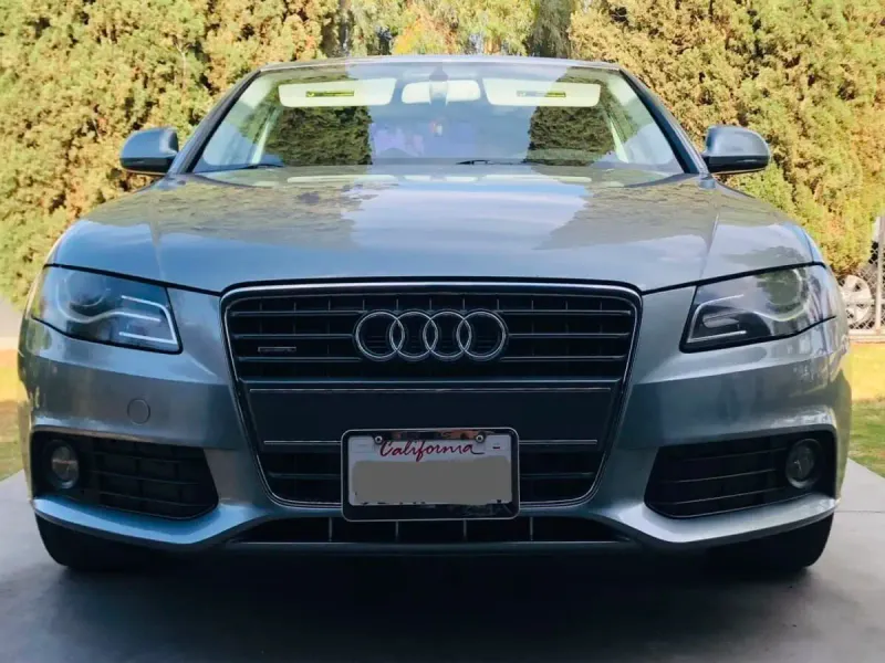 Audi A4 no-drill no-holes front license plate bracket holder mount frame relocator slats grille