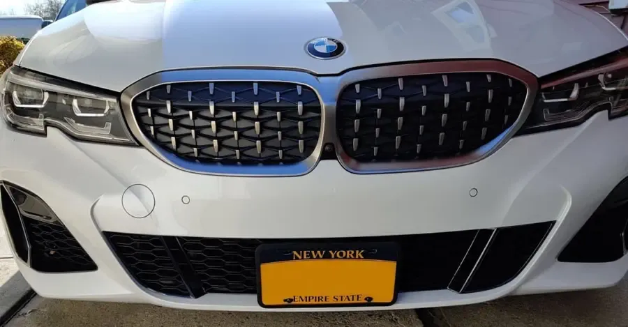 True no drill license plate bracket for BMW M340i.  No drill No holes license plate holder mount bracket relocator.