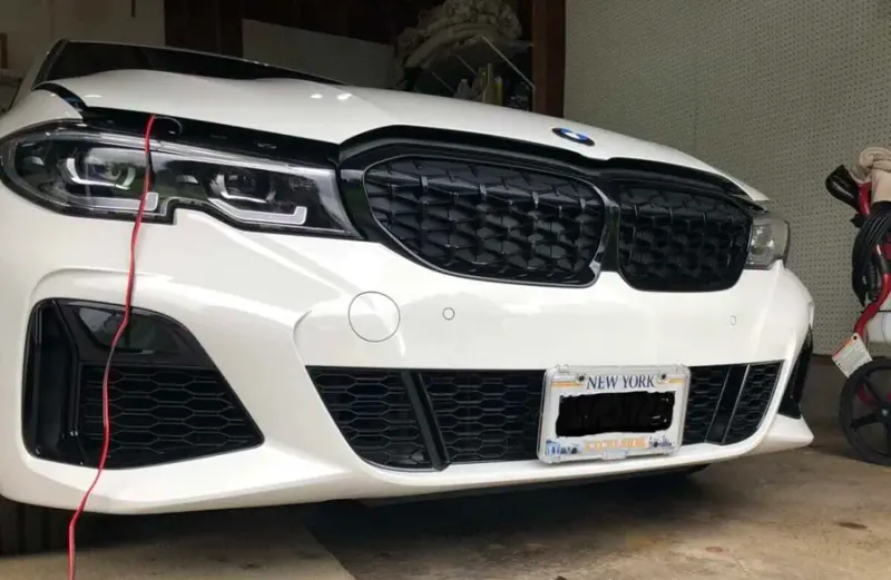 True no drill license plate bracket for BMW M340i.  No drill No holes license plate holder mount bracket relocator.