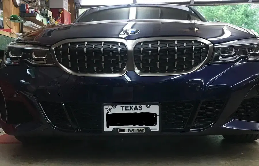 True no drill license plate bracket for BMW M340i.  No drill No holes license plate holder mount bracket relocator.