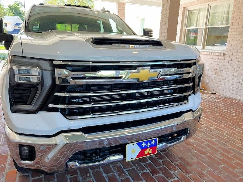 Sly Bracket for 2024-2026 Chevy Silverado 2500 HD with horizontal slat lower grille.