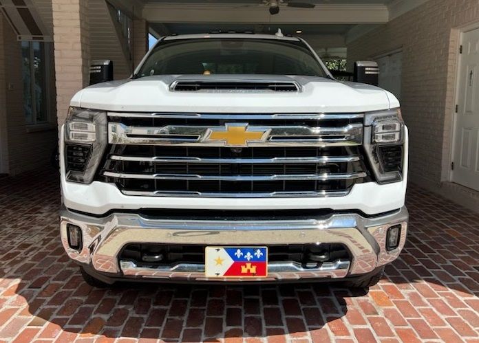 Sly Bracket for 2024-2026 Chevy Silverado 2500 HD with horizontal slat lower grille.