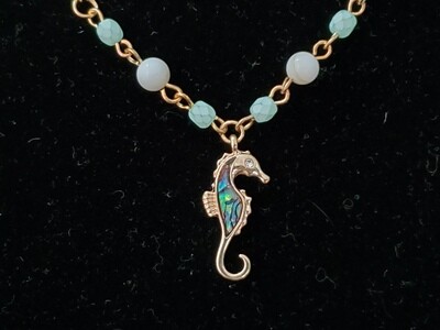 Seahorse with abalone inset