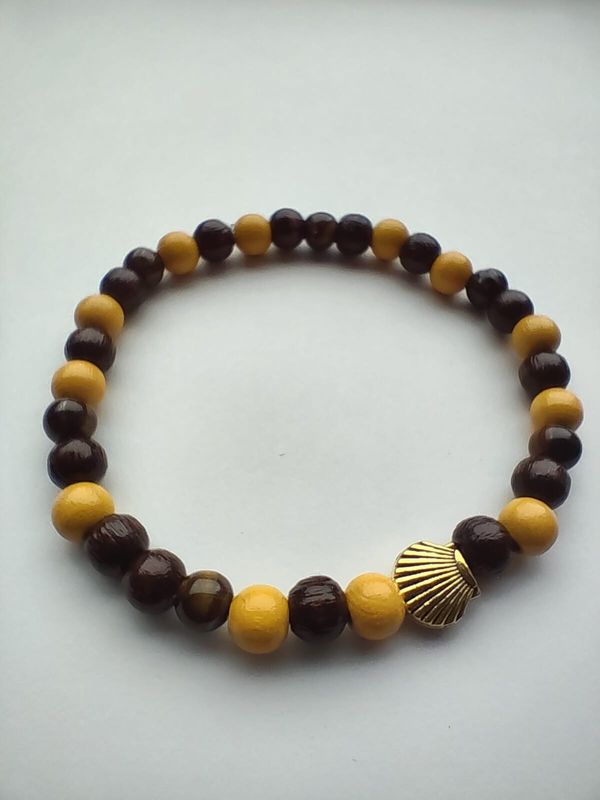 Armbandje met goudkleurige Jacobsschelp