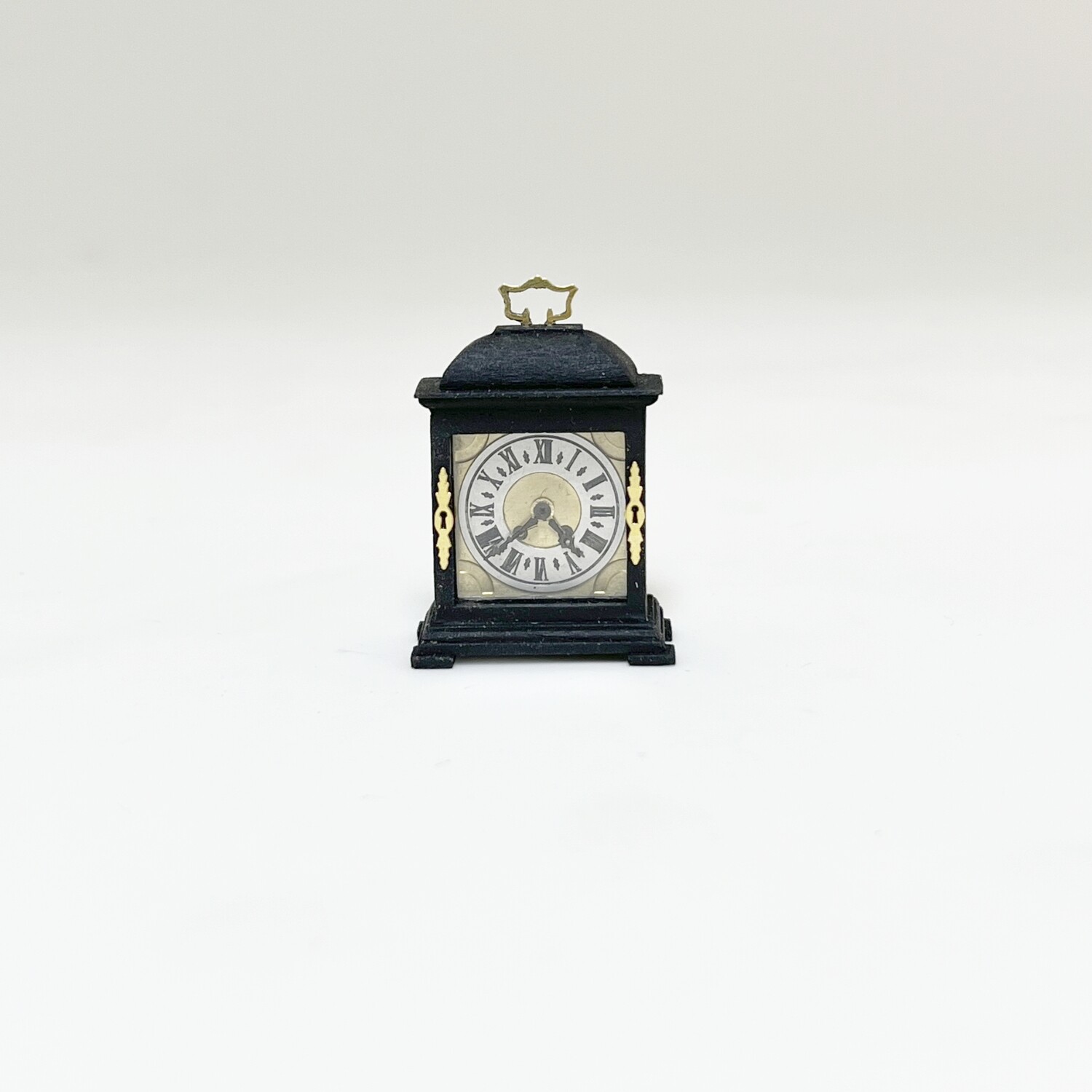 small 17thc ebonsied bracket clock
