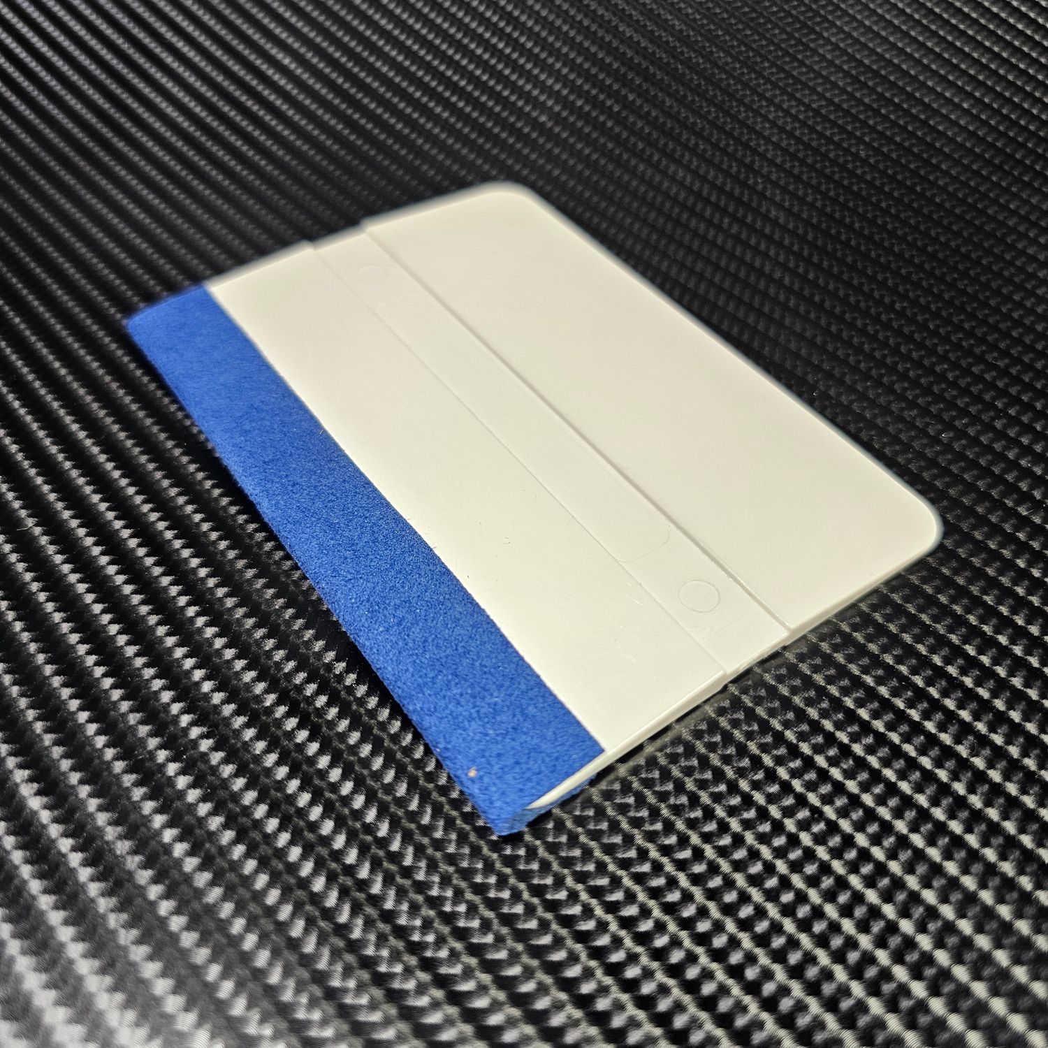 Felt tipped squeegee