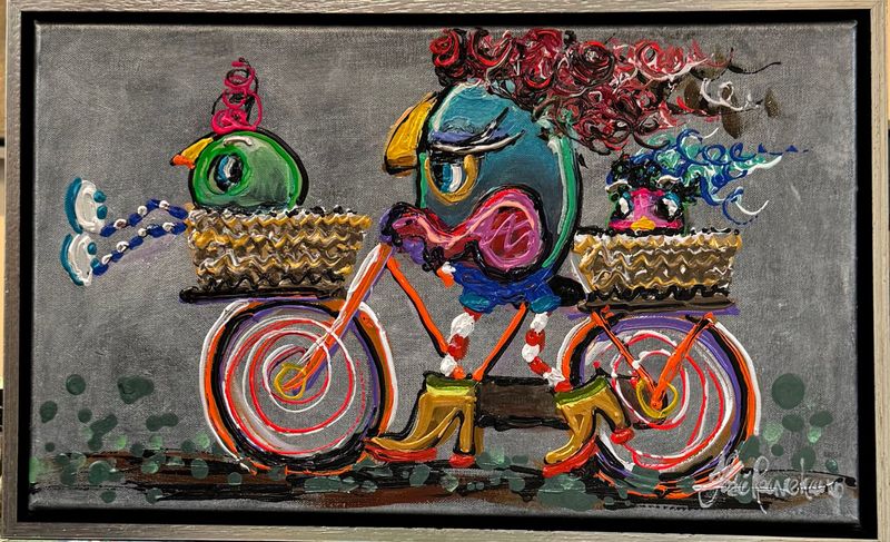 Smal birds on a bike