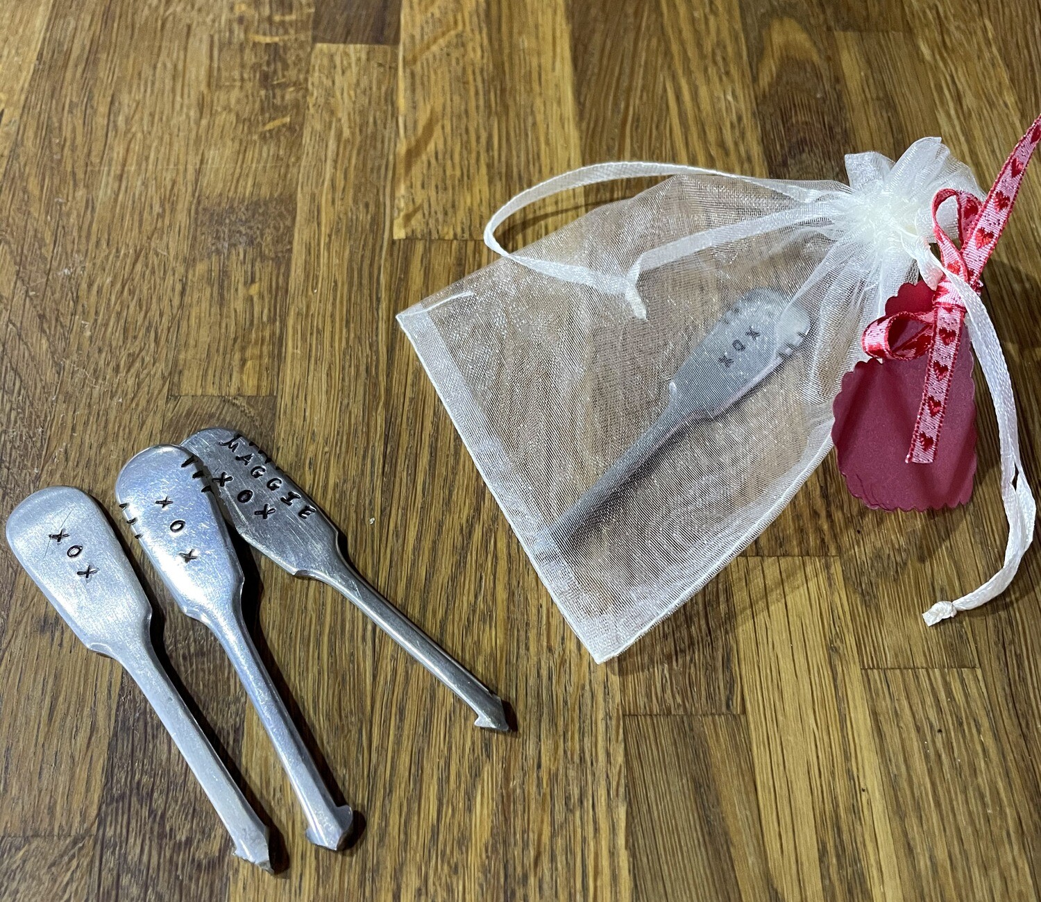 Wedding or Anniversary Cupid&#39;s Arrow  X O X  - in organza bag with red heart label