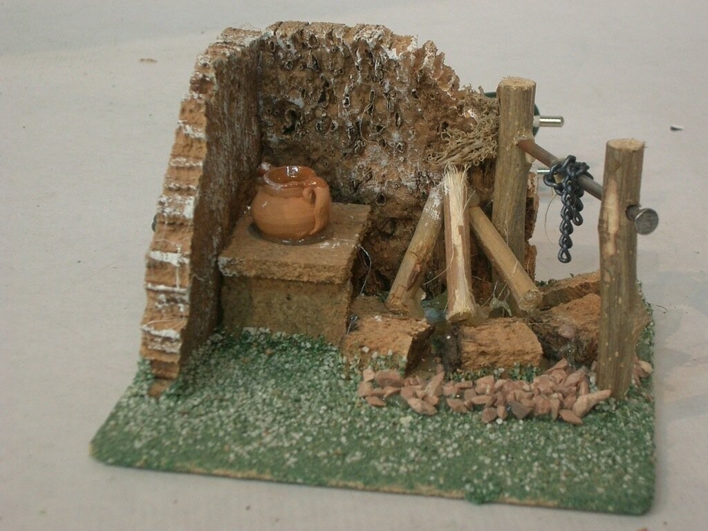HOGUERA RINCON CON LUZ ANFORA BARRO