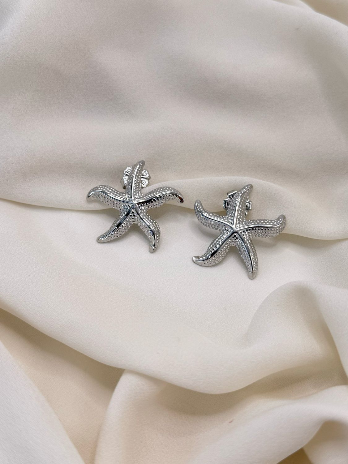 Orecchini stella marina silver