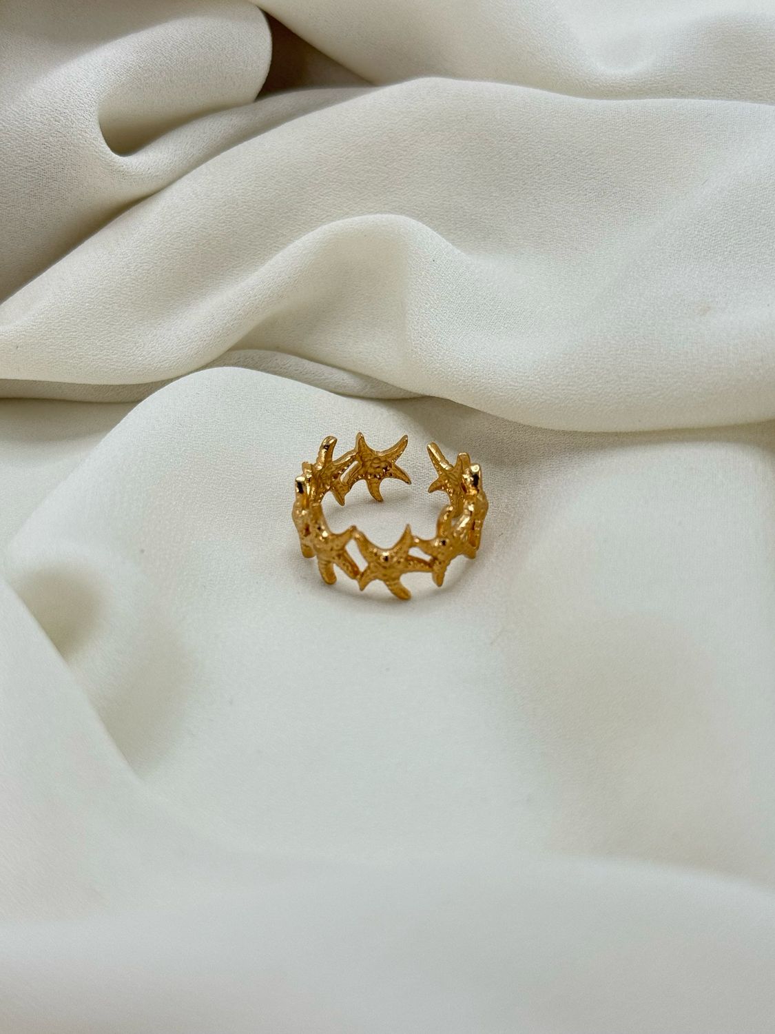 Anello fascia stella marina Gold