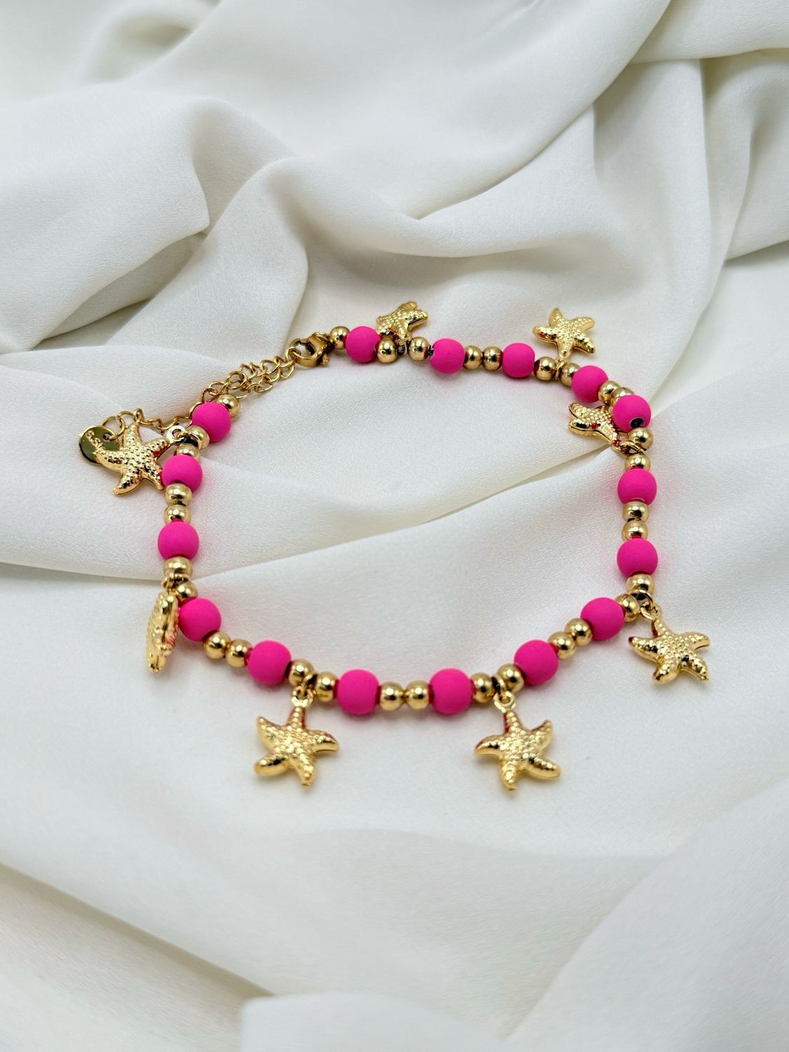 Cavigliera marina fucsia