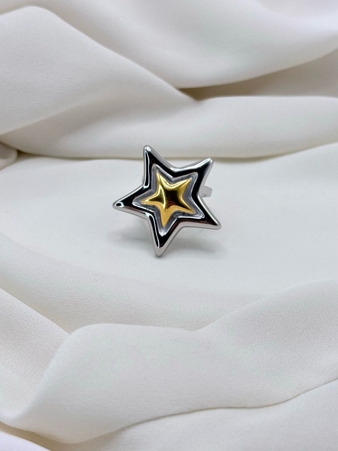 Anello stella bicolor