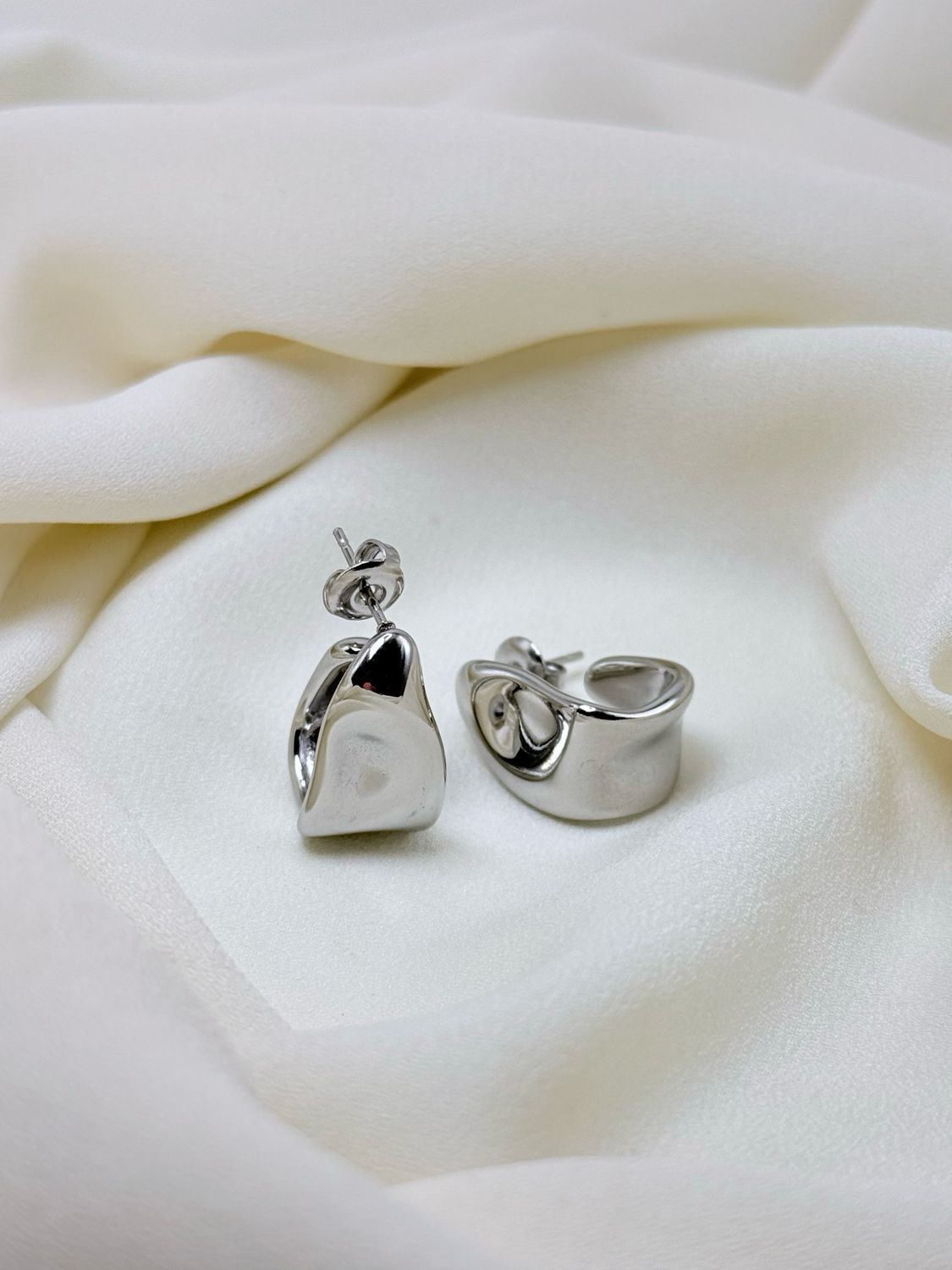 Orecchini versus silver