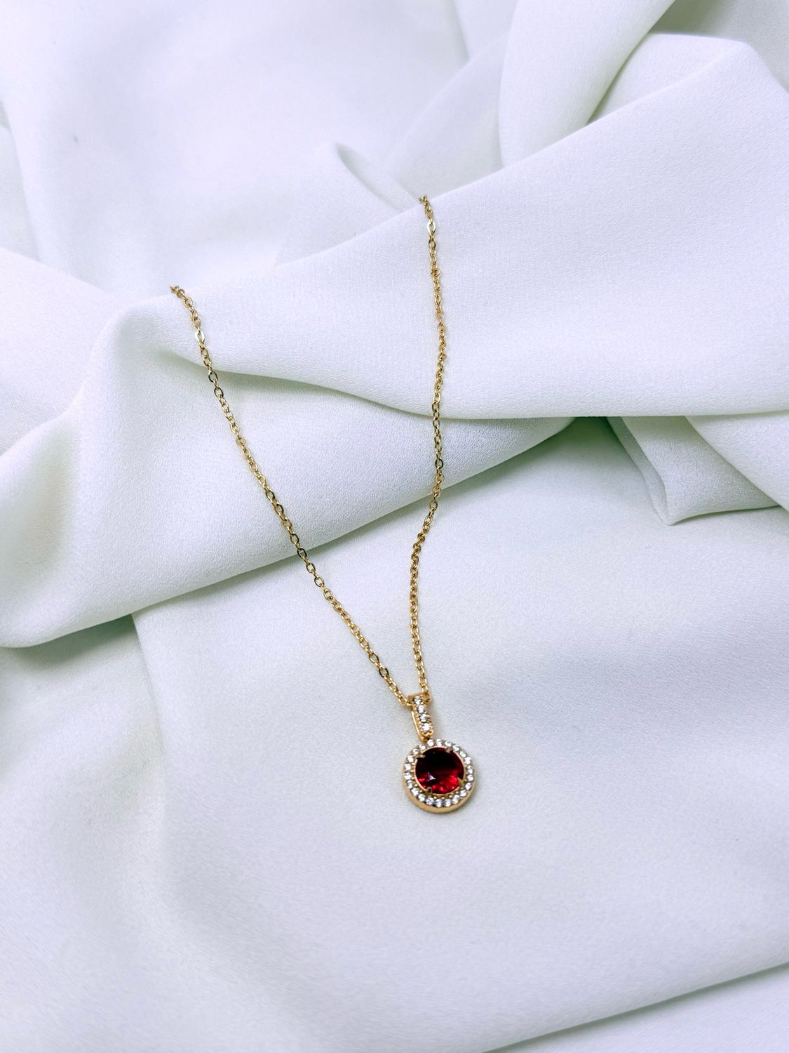 Collana punto luce rosso