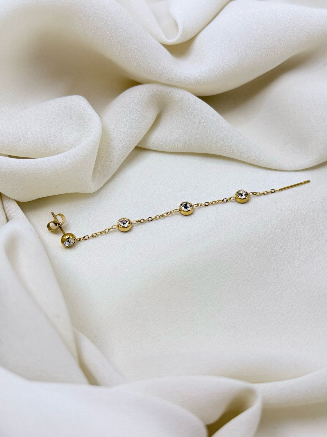 Orecchino cometa white gold