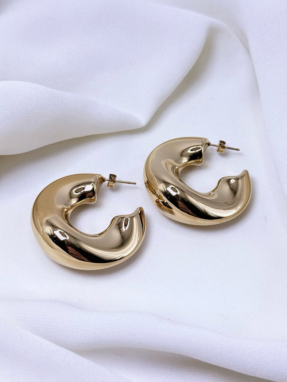 Orecchini waves gold