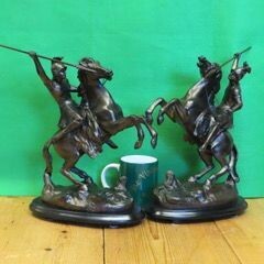 Pair of Magnificent Bronzed Spelter Horsemen Sculptures.