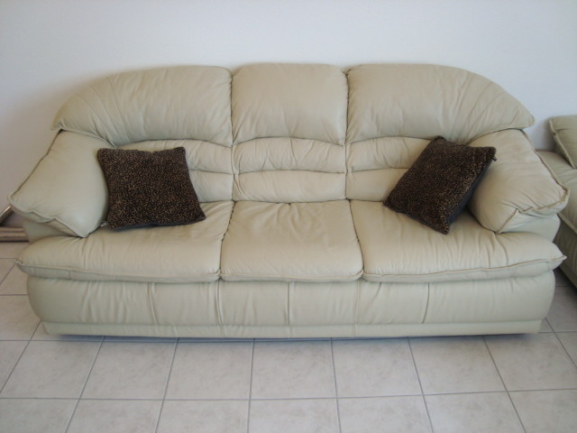 4-Pieces of Creme Leather set-- Couch- Love seat- OverStuffed Chair &amp; Ottoman