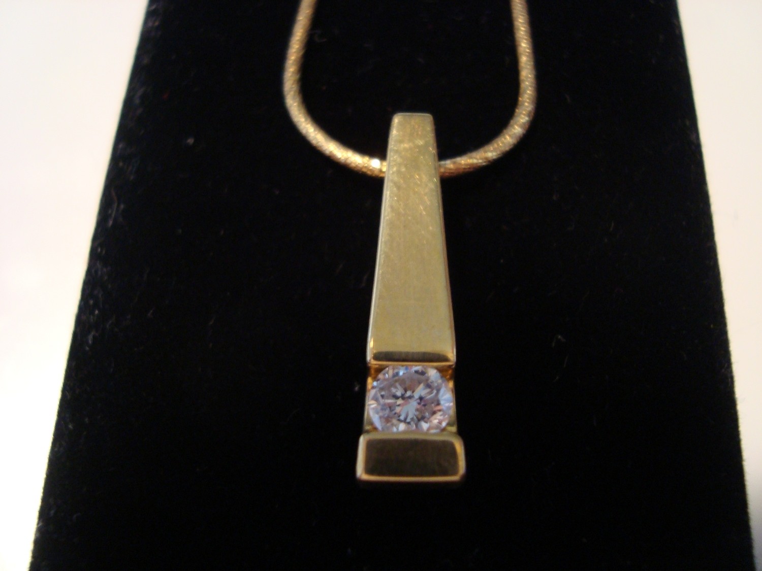 Women&#39;s 14K Gold necklace w/ solid Gold fob w/ 3/4 carat diamond.