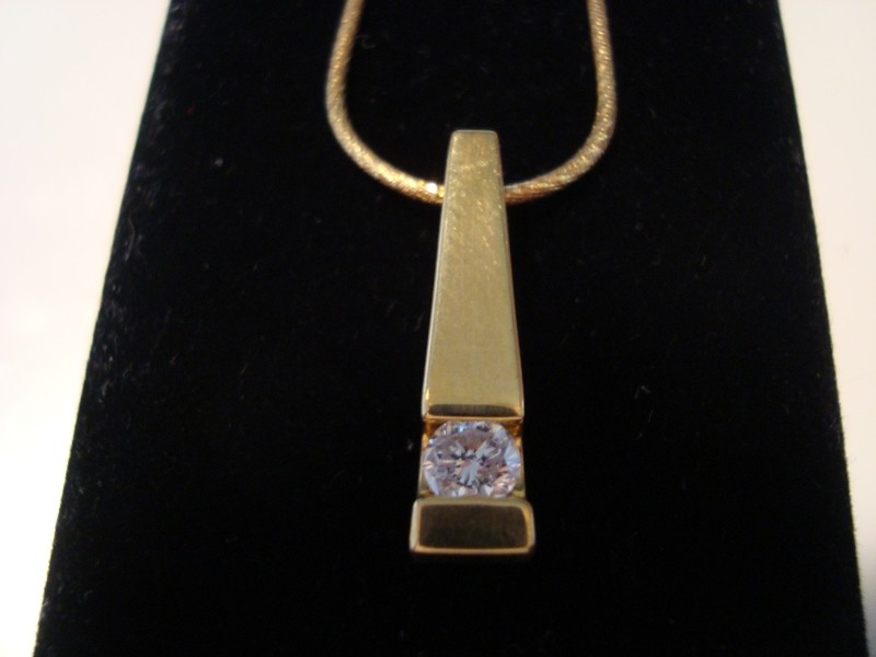 Women&#39;s 14K Gold necklace w/ solid Gold fob w/ 3/4 carat diamond.