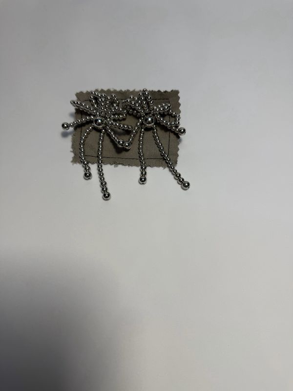 Brincos compridos laço