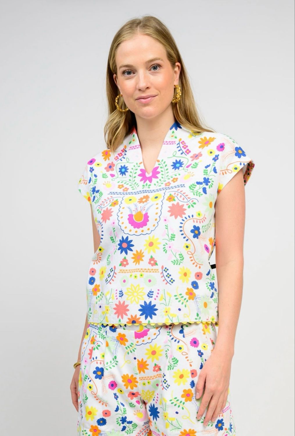 Sister Mary Flores Top