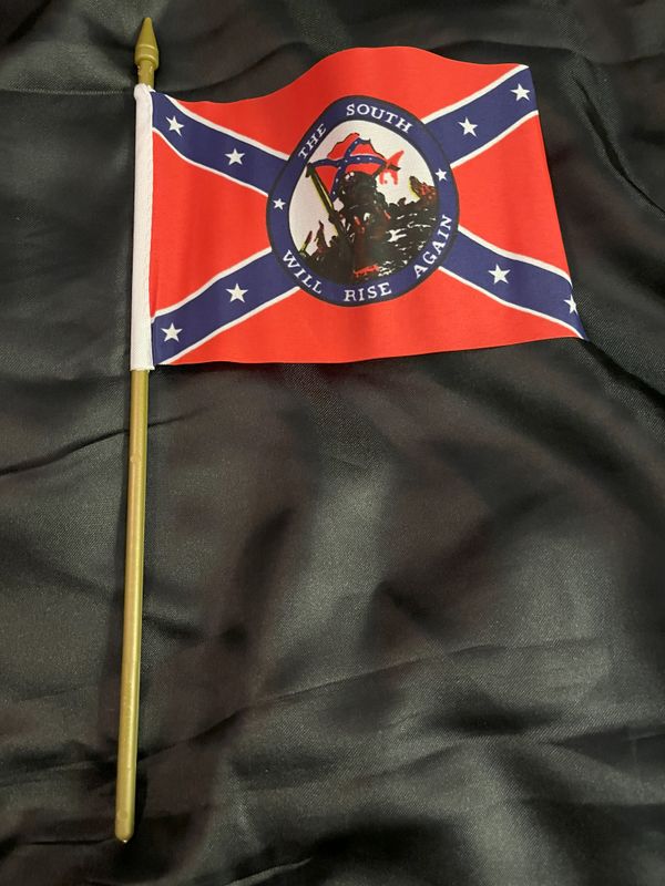 The South will Rise Again flag on a stick