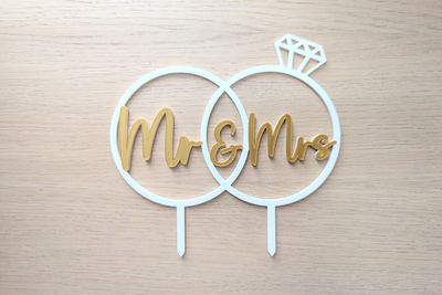 Taarttopper huwelijk - ringen Mr & Mrs