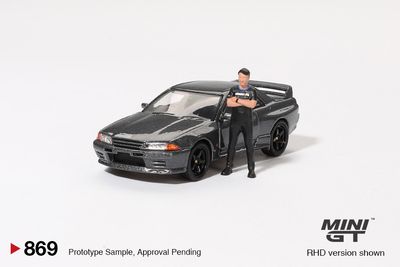 1:64 Nissan Skyline GT-R (R32) Nismo Gunmetal with Tsugio Matsuda Figure Collection 1992 (RHD) - MINI GT