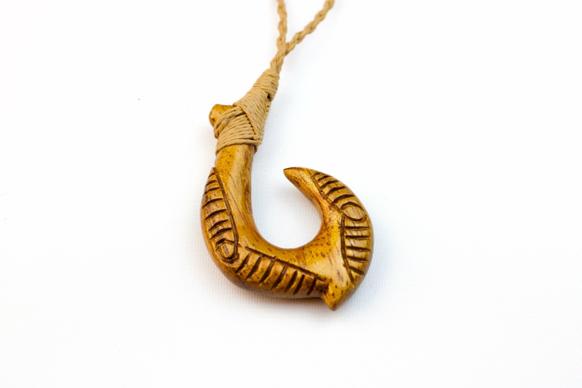 Koa Carved Fish Hook Pendant on Adjustable Hand Braided Tan Cord
