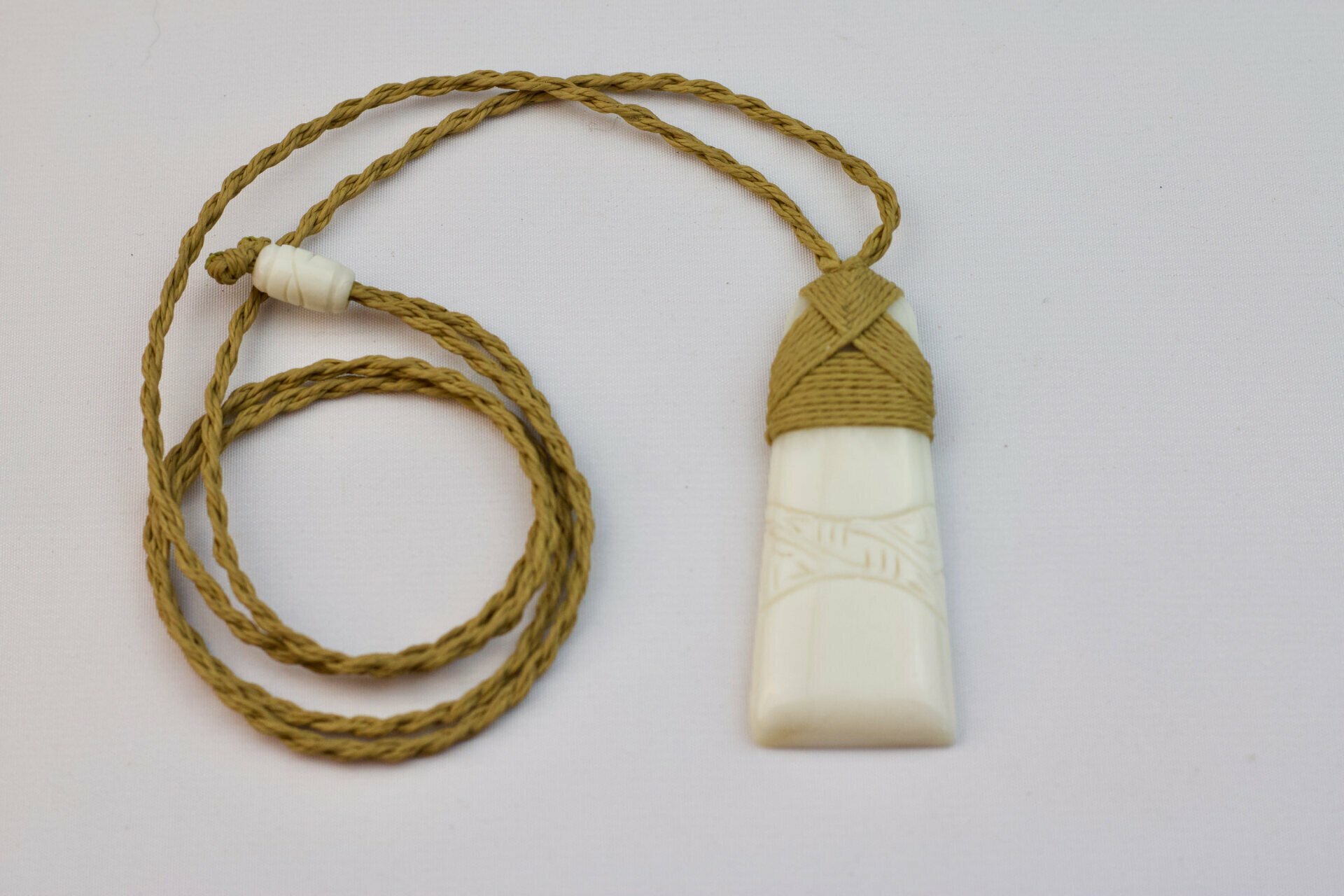 Carved Bone Toki Adze Necklace