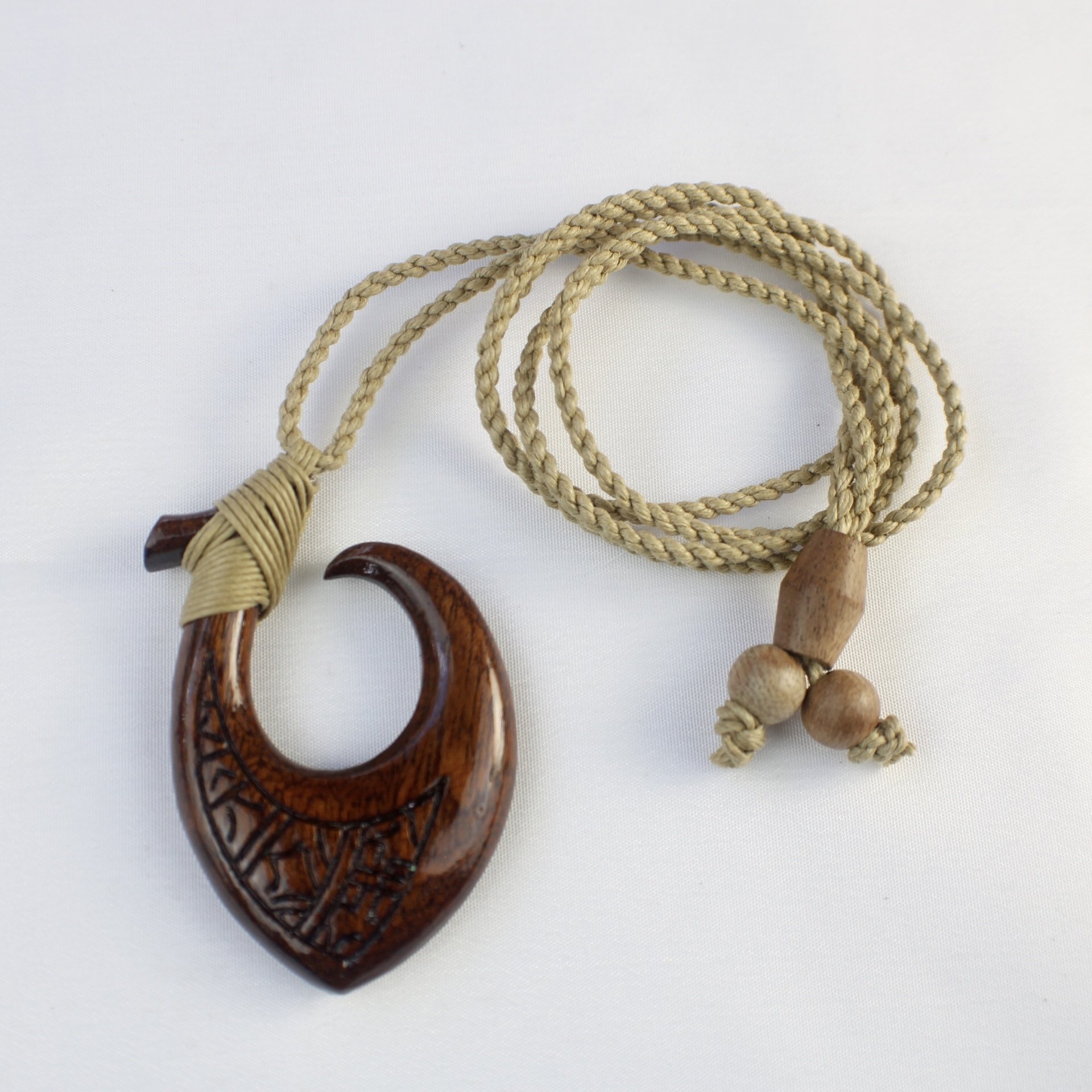 Koa Fish Hook Tribal Design Pendant on Adjustable Hand Braided Tan Cord