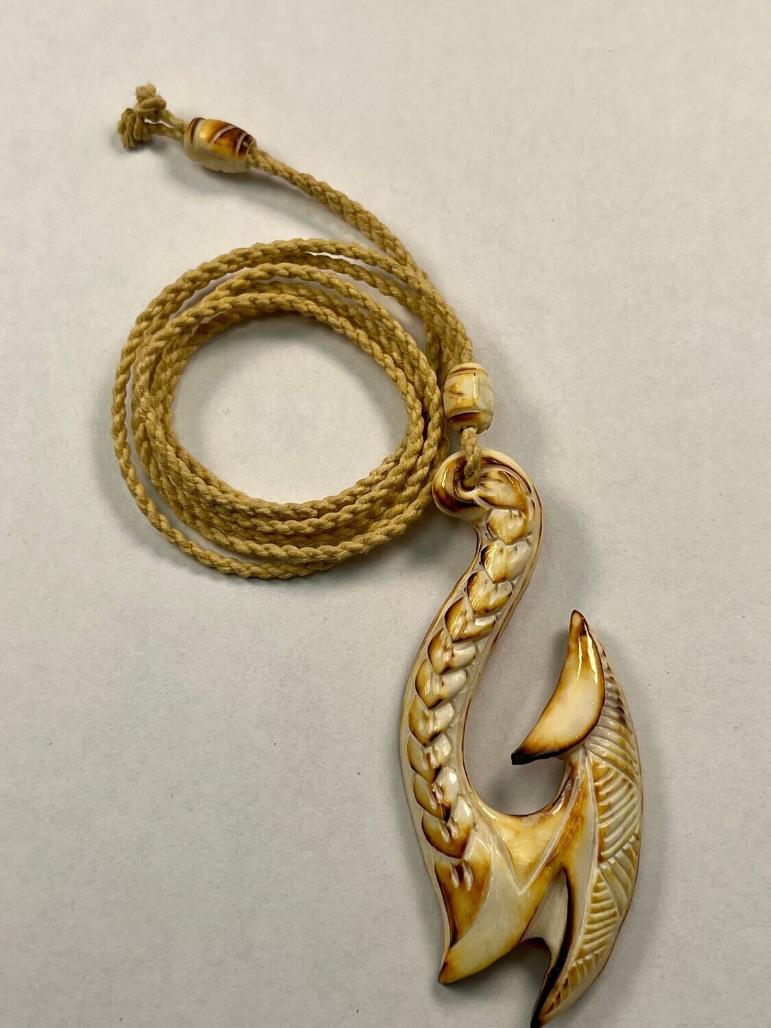 Tribal Bone Hawaiian Fish Hook Pendant on Adjustable Hand Braided Tan Cord