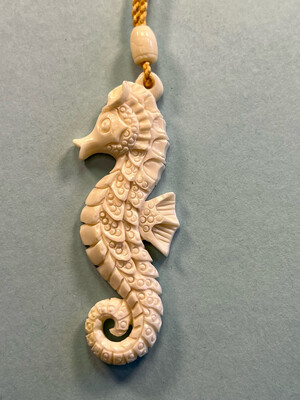 Carved Bone Sea Horse Pendant on Adjustable Hand Braided Tan Cord