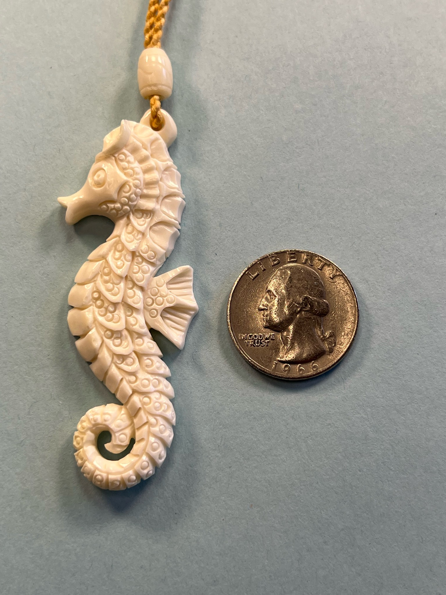 Carved Bone Sea Horse Pendant on Adjustable Hand Braided Tan Cord