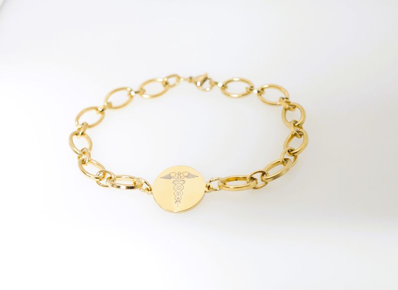 Elegant Medical bracelet available in gold and silver finish.