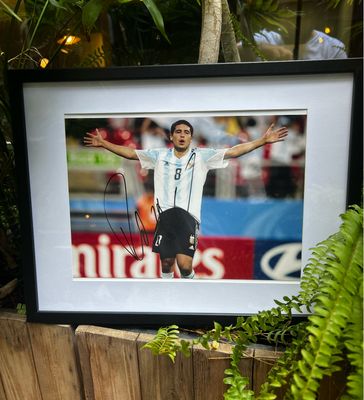 תמונה חתומה של חואן רומאן ריקלמה