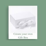 White Ribbon Tied Gift Box