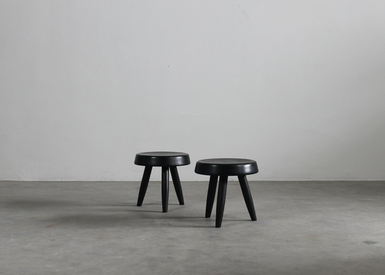 Charlotte Perriand (In the style of) Set of Two Black Stools in Wood 1950s