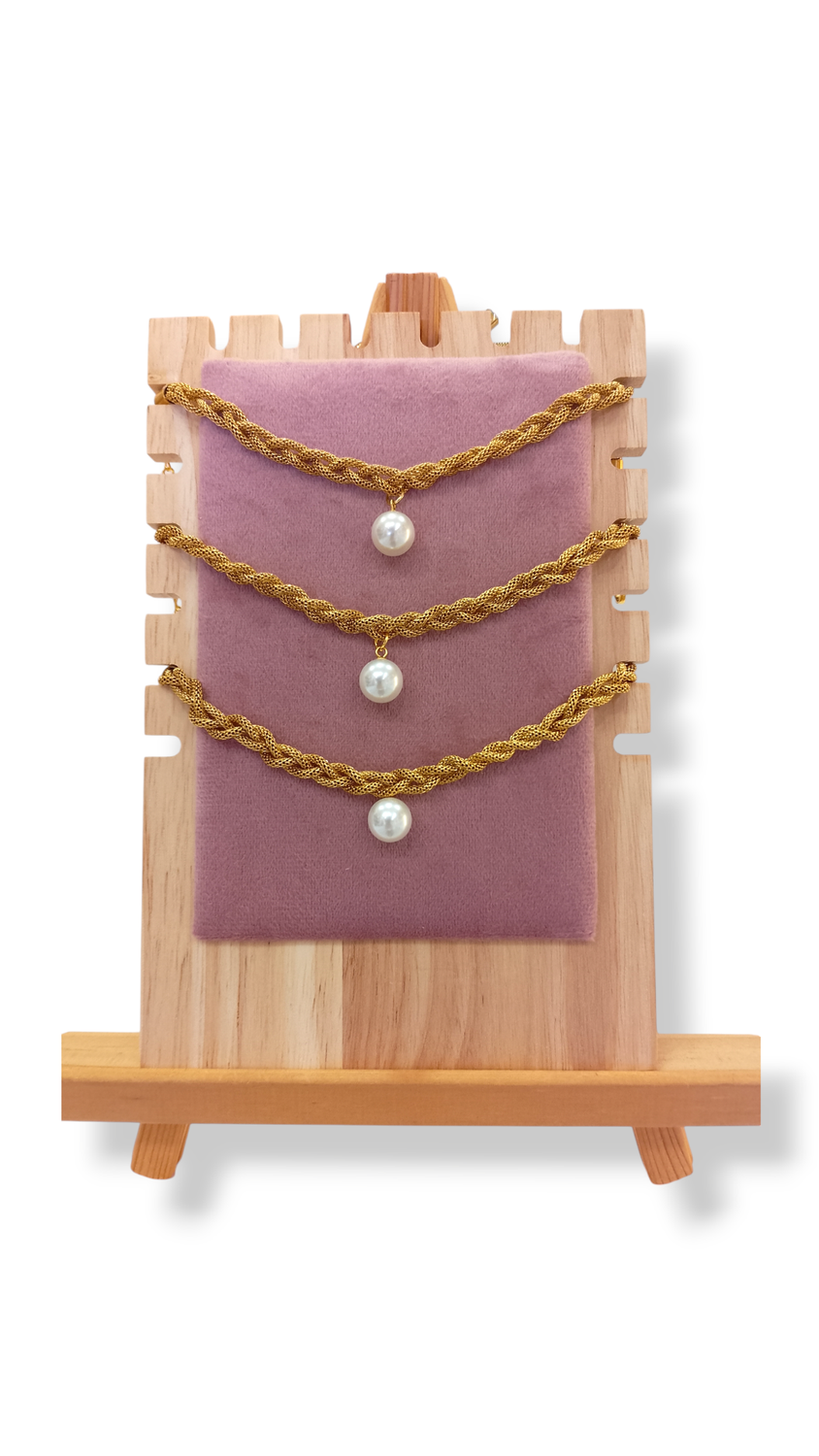 Pulseras trenzadas con perla