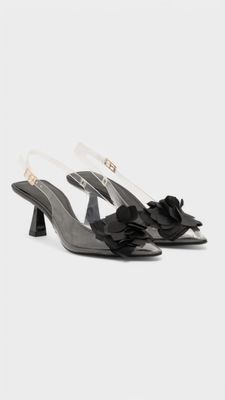 Tacon transparente flor negro
