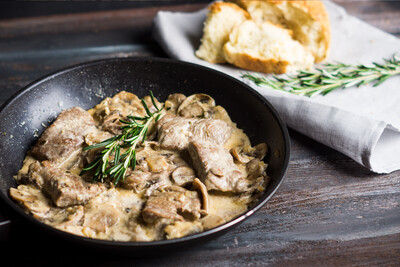 Medallions of Pork Fillet with Mushrooms in a Creamy Herb Sauce